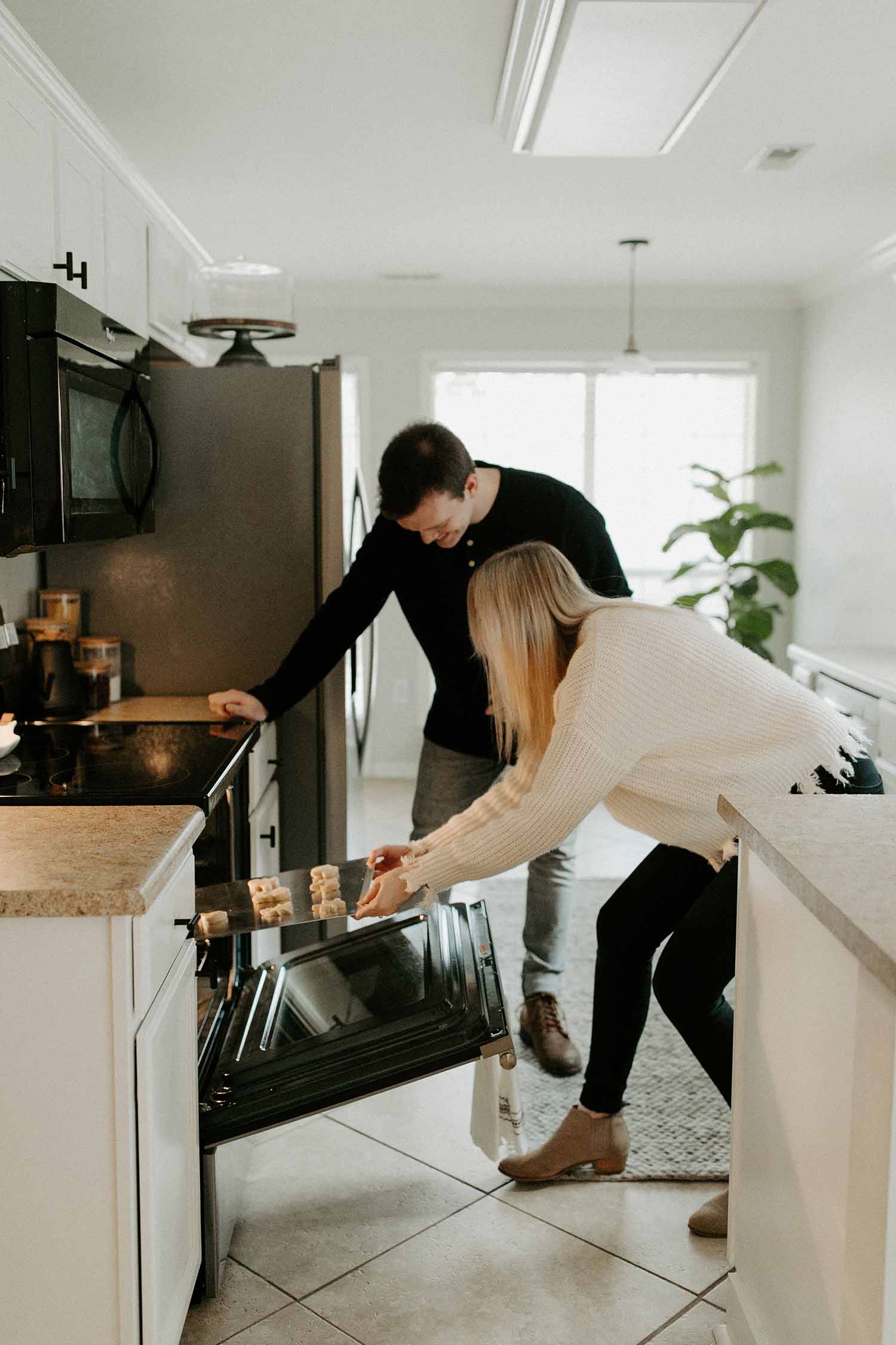 a person and person in a kitchen